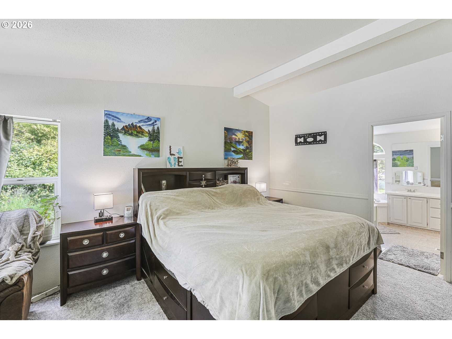 33411 Blaha Road Warren, OR 97053 - Photo 19 of 48 a bedroom with a bed and painting on the wall