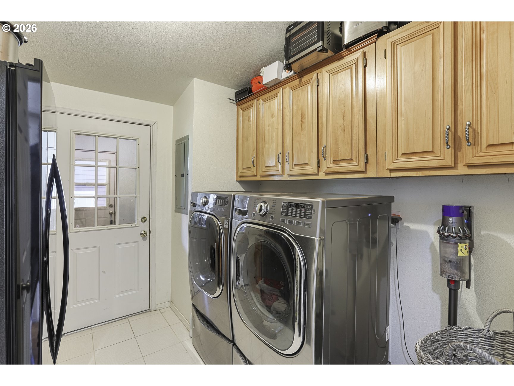 33411 Blaha Road Warren, OR 97053 - Photo 24 of 48 a view of a storage and utility room with washer and dryer