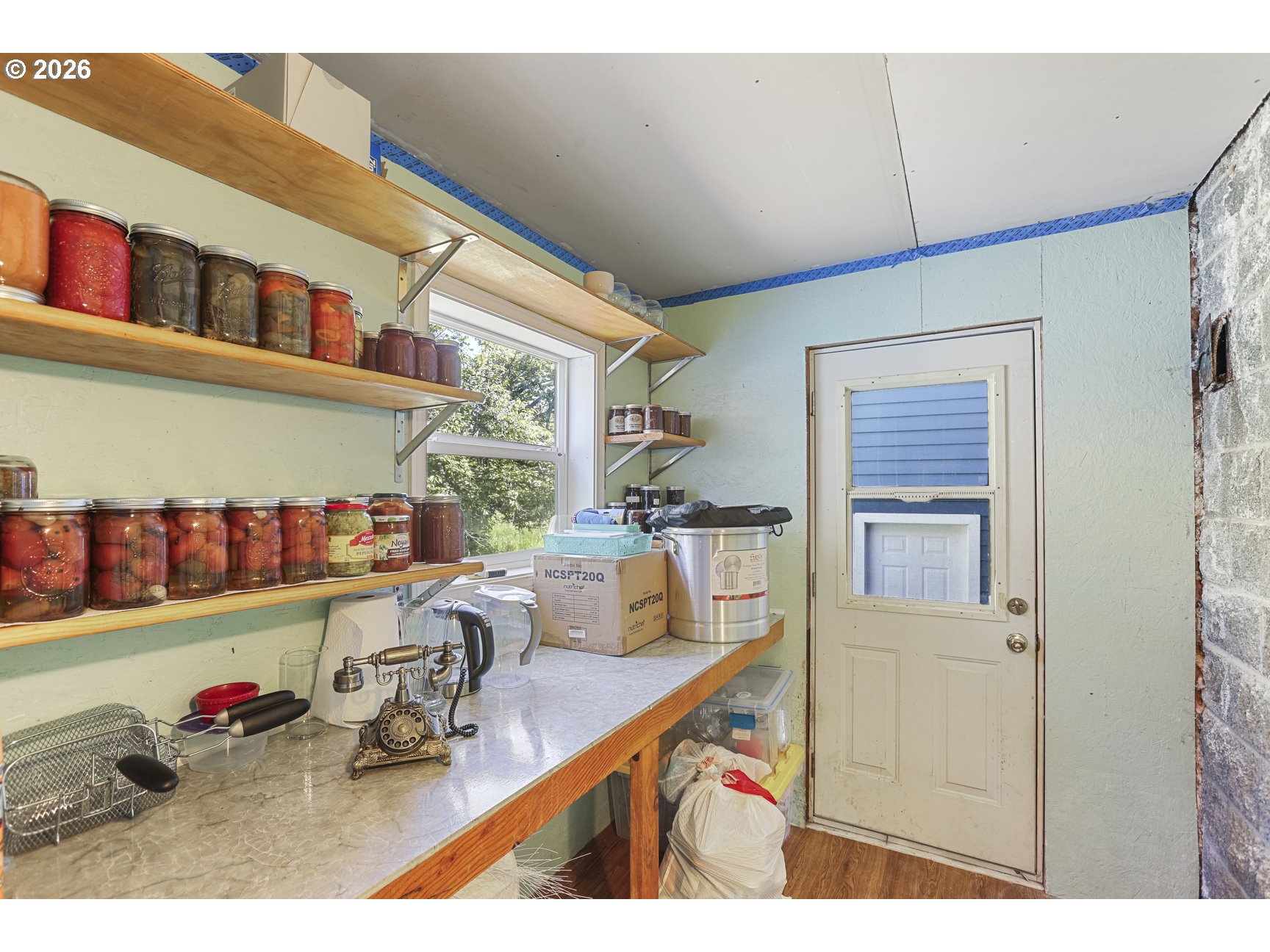 33411 Blaha Road Warren, OR 97053 - Photo 25 of 48 a kitchen with a refrigerator and a stove