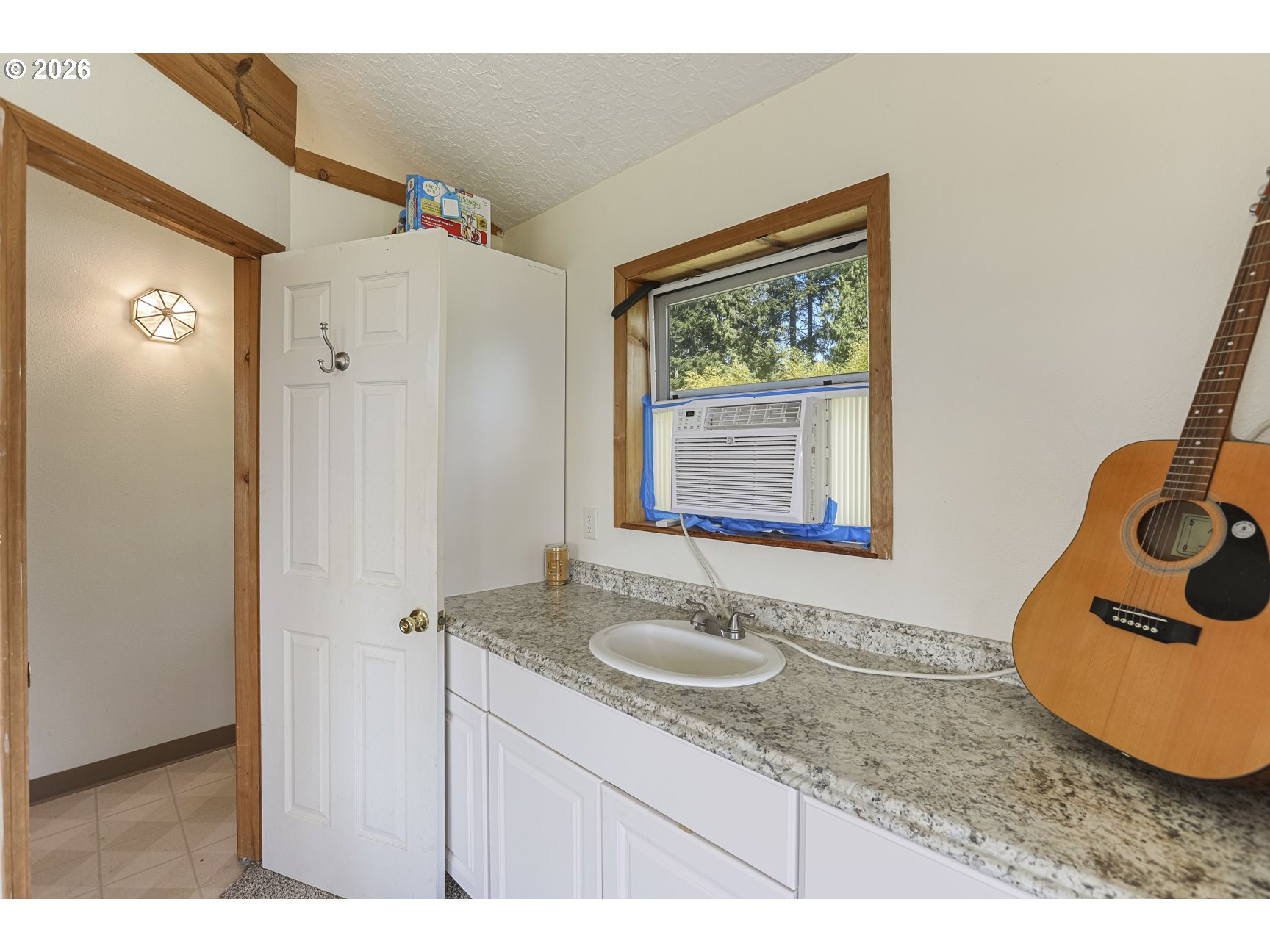 33411 Blaha Road Warren, OR 97053 - Photo 31 of 48 a bathroom with a sink and mirror with bathtub