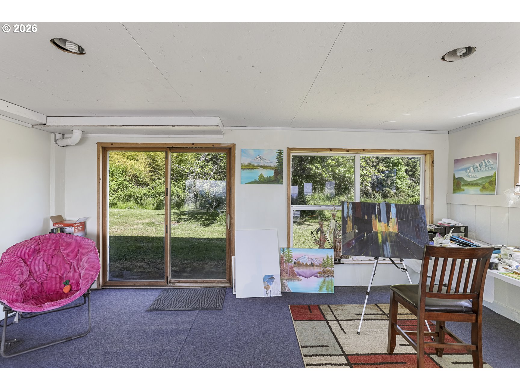 33411 Blaha Road Warren, OR 97053 - Photo 33 of 48 a living room with furniture and a window
