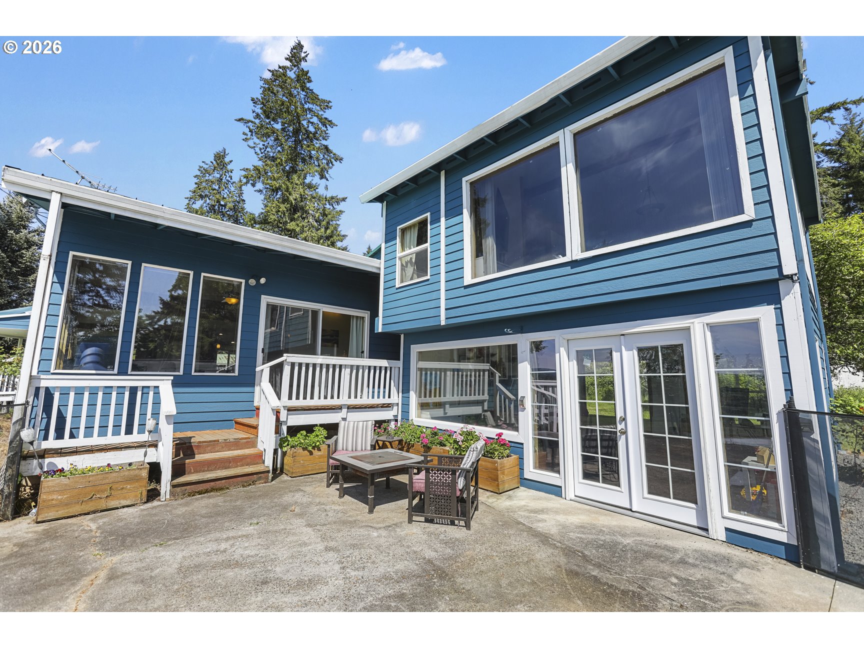 33411 Blaha Road Warren, OR 97053 - Photo 37 of 48 a backyard of a house with table and chairs