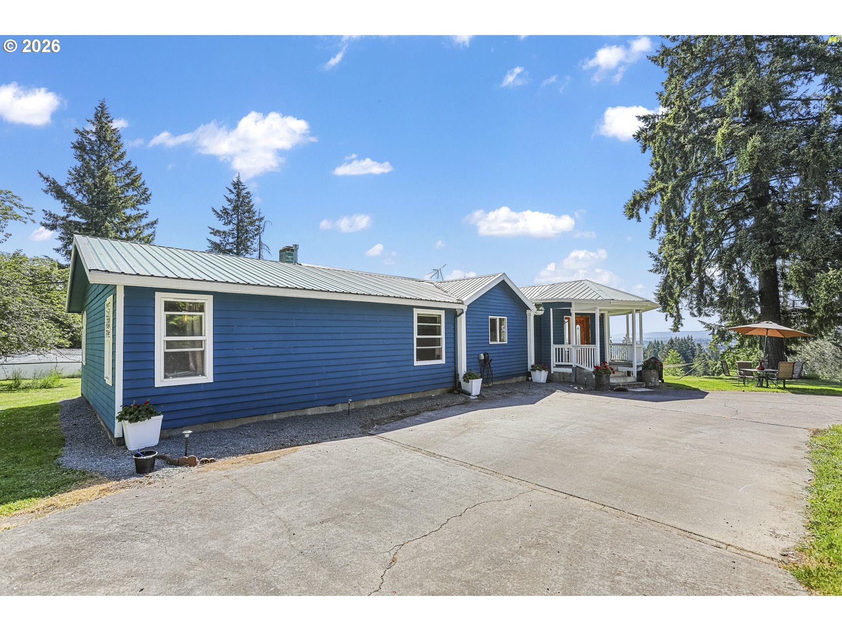 33411 Blaha Road Warren, OR 97053 - Photo 40 of 48 a view of a house with a yard