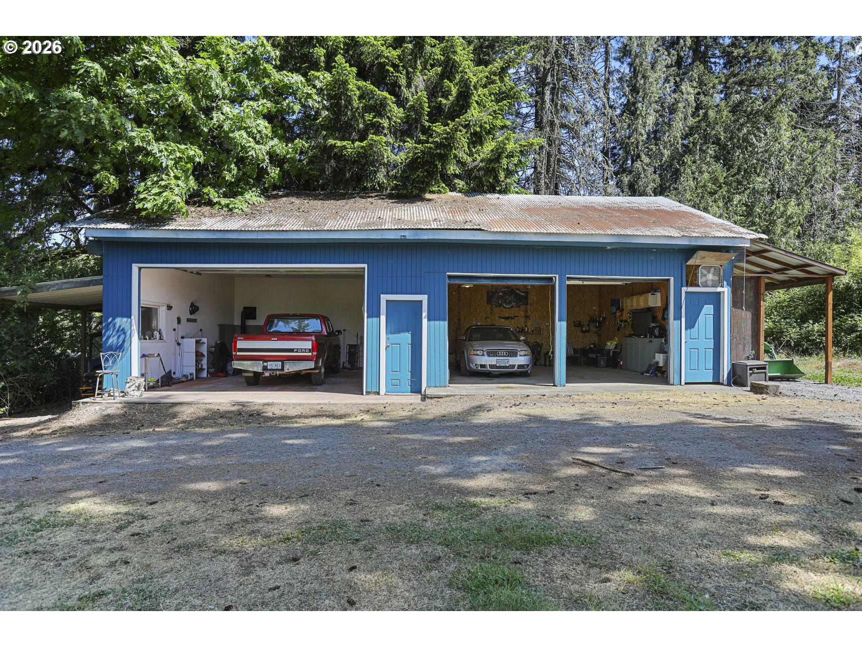 33411 Blaha Road Warren, OR 97053 - Photo 45 of 48 a front view of a house with a garden