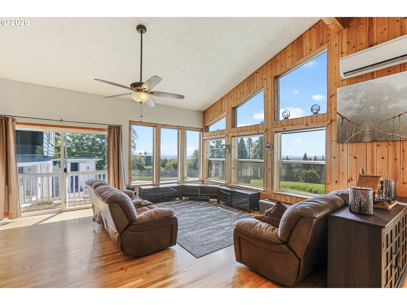 33411 Blaha Road Warren, OR 97053 - Photo 5 of 48 a living room with furniture and large windows
