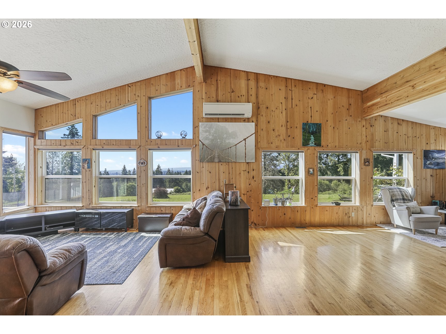 33411 Blaha Road Warren, OR 97053 - Photo 8 of 48 a living room with furniture and large windows