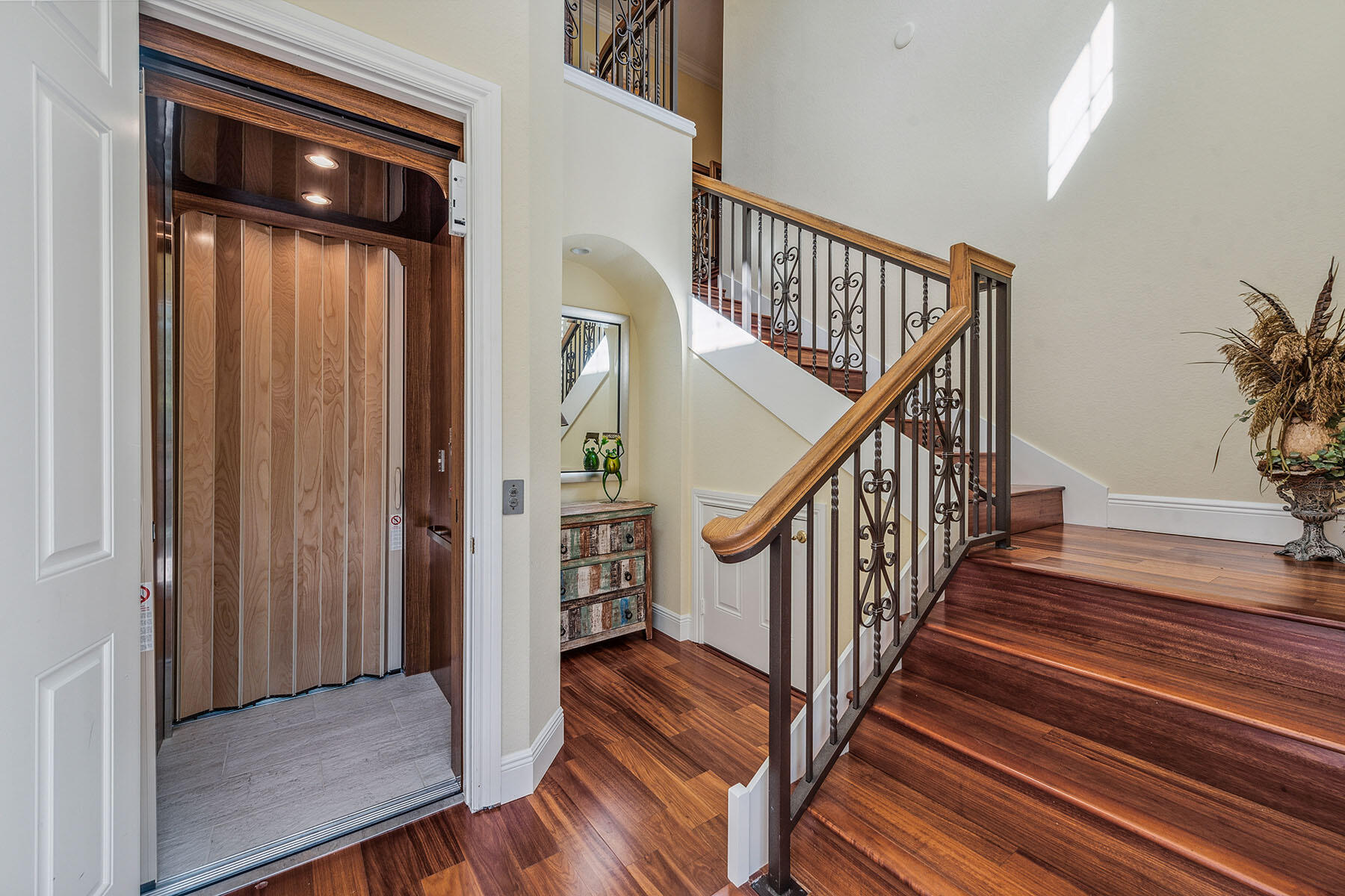 3189 Aviamar Circle, Unit 202 Naples, FL 34114 - Photo 21 of 50 a view of entryway and hall with wooden floor