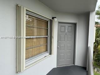 a view of walk in closet with window