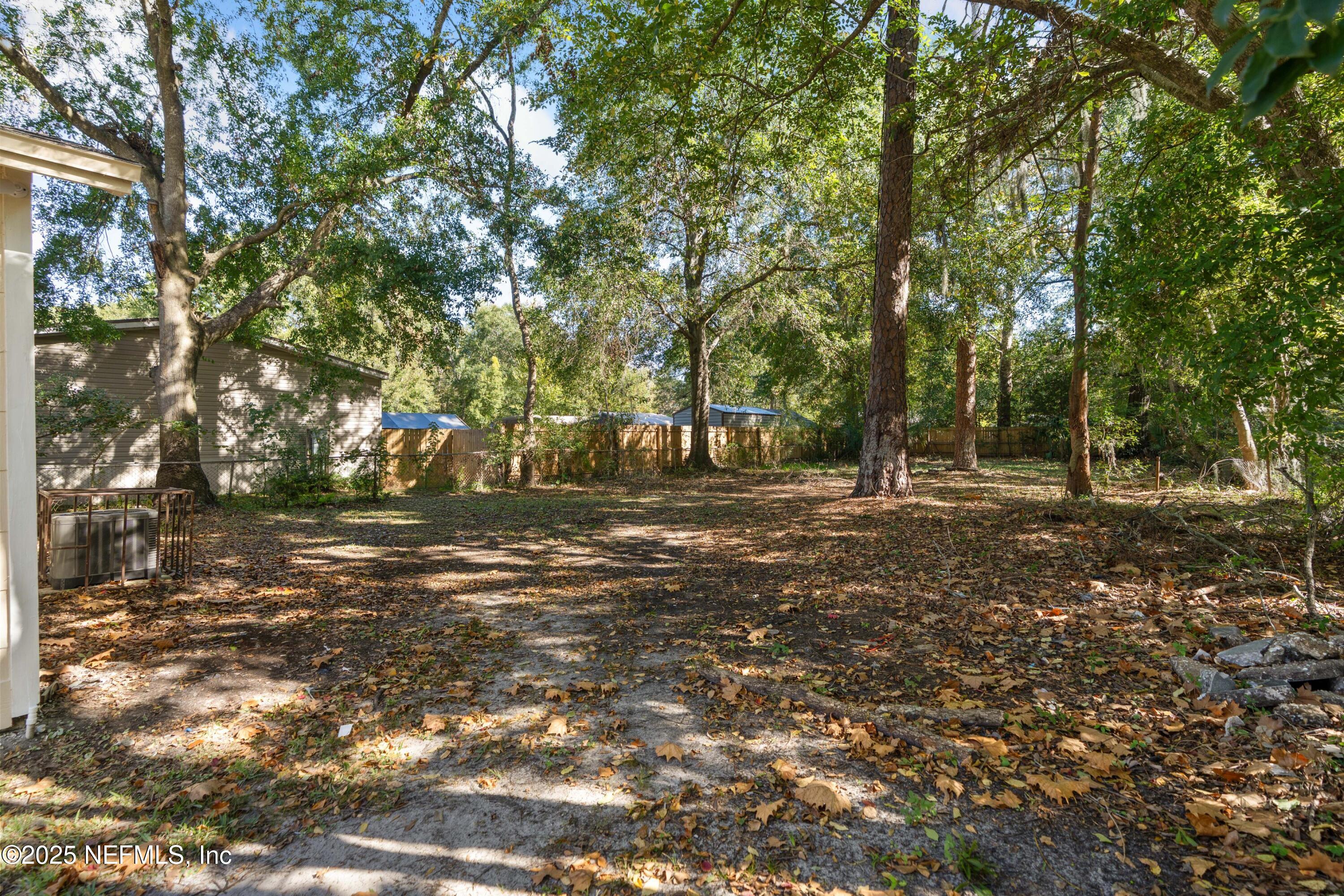 1169 Comanche Street Jacksonville, FL 32205 - Photo 22 of 24 a view of outdoor space with trees