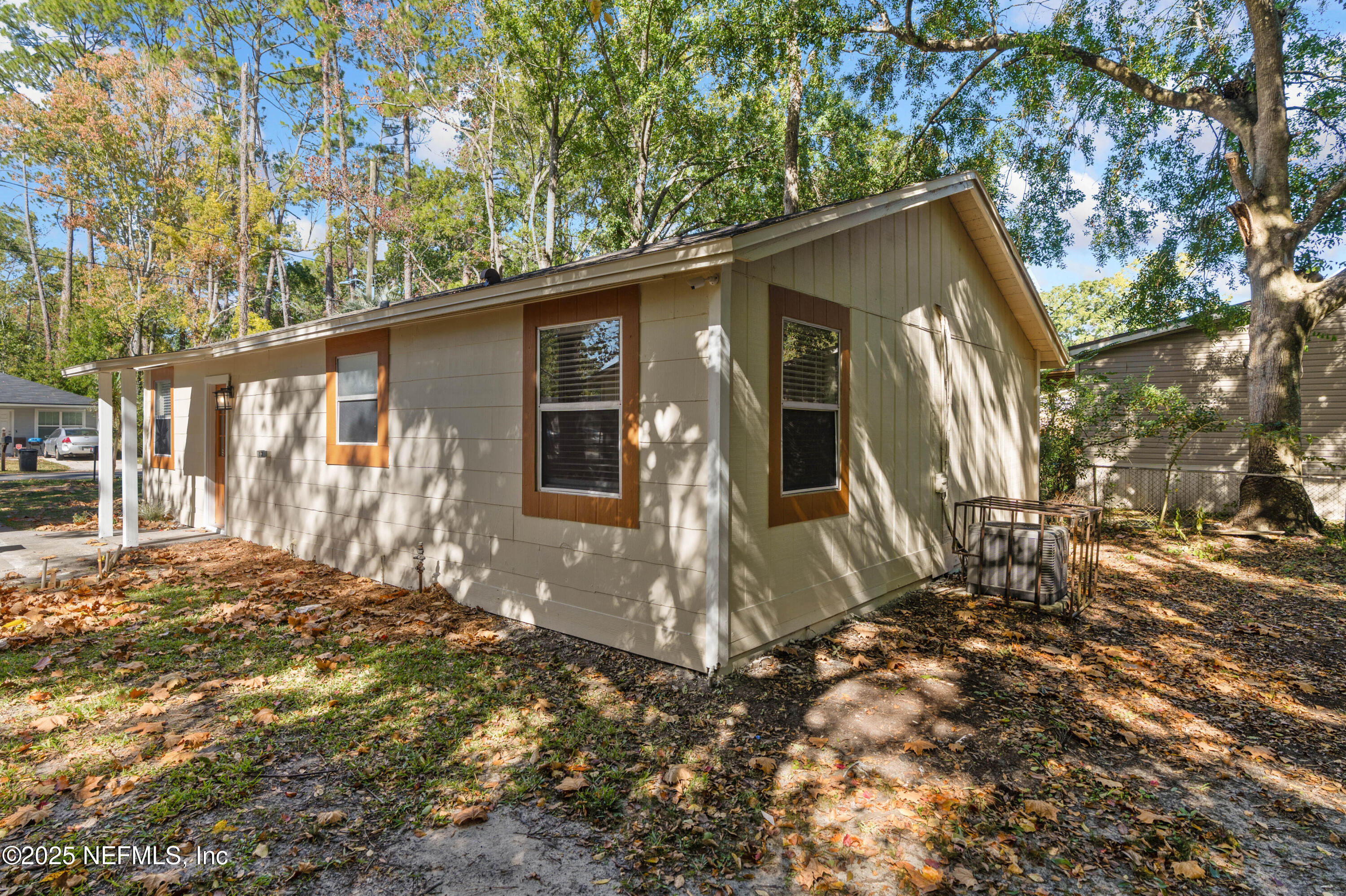 1169 Comanche Street Jacksonville, FL 32205 - Photo 4 of 24 a view of a house with a yard