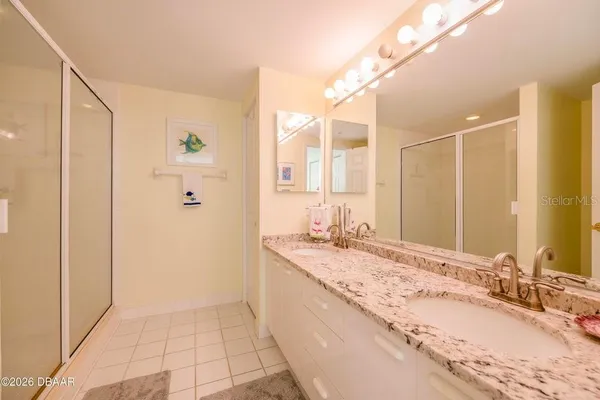 a bathroom with a shower and a toilet
