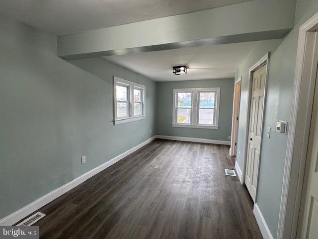2185 East Wheat Road, Unit D Vineland, NJ 08361 - Photo 11 of 25 a view of an empty room with wooden floor and a window