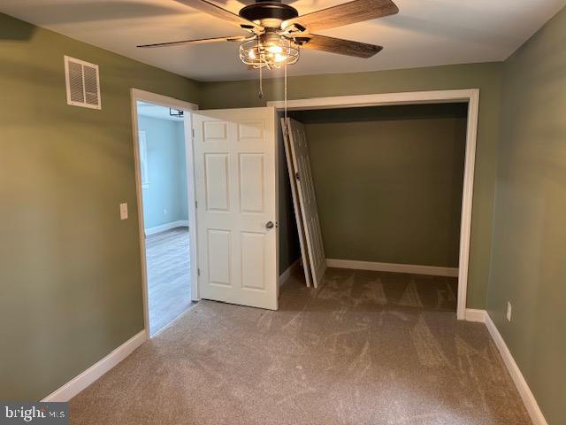 2185 East Wheat Road, Unit D Vineland, NJ 08361 - Photo 14 of 25 an empty room with windows and fan