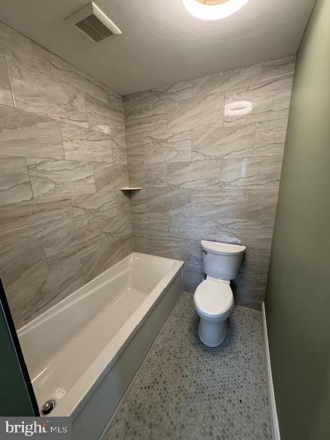 2185 East Wheat Road, Unit D Vineland, NJ 08361 - Photo 18 of 25 a bathroom with a toilet and a bathtub