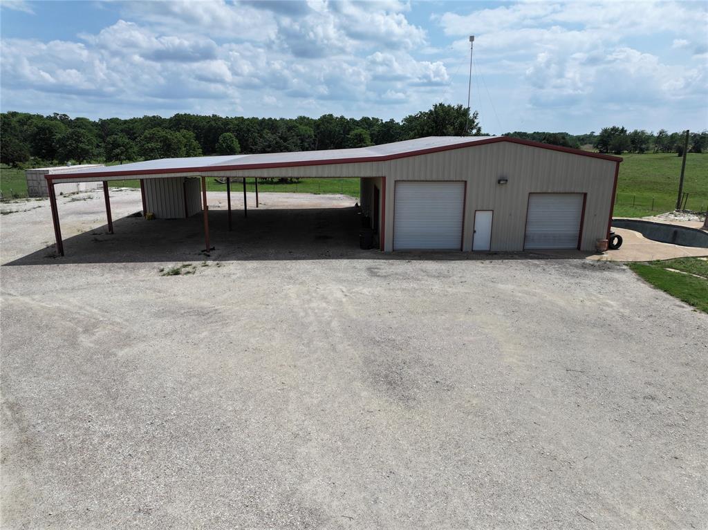 800 County Road 2807 Mabank, TX 75147 - Photo 3 of 40 a view of a terrace with a bench