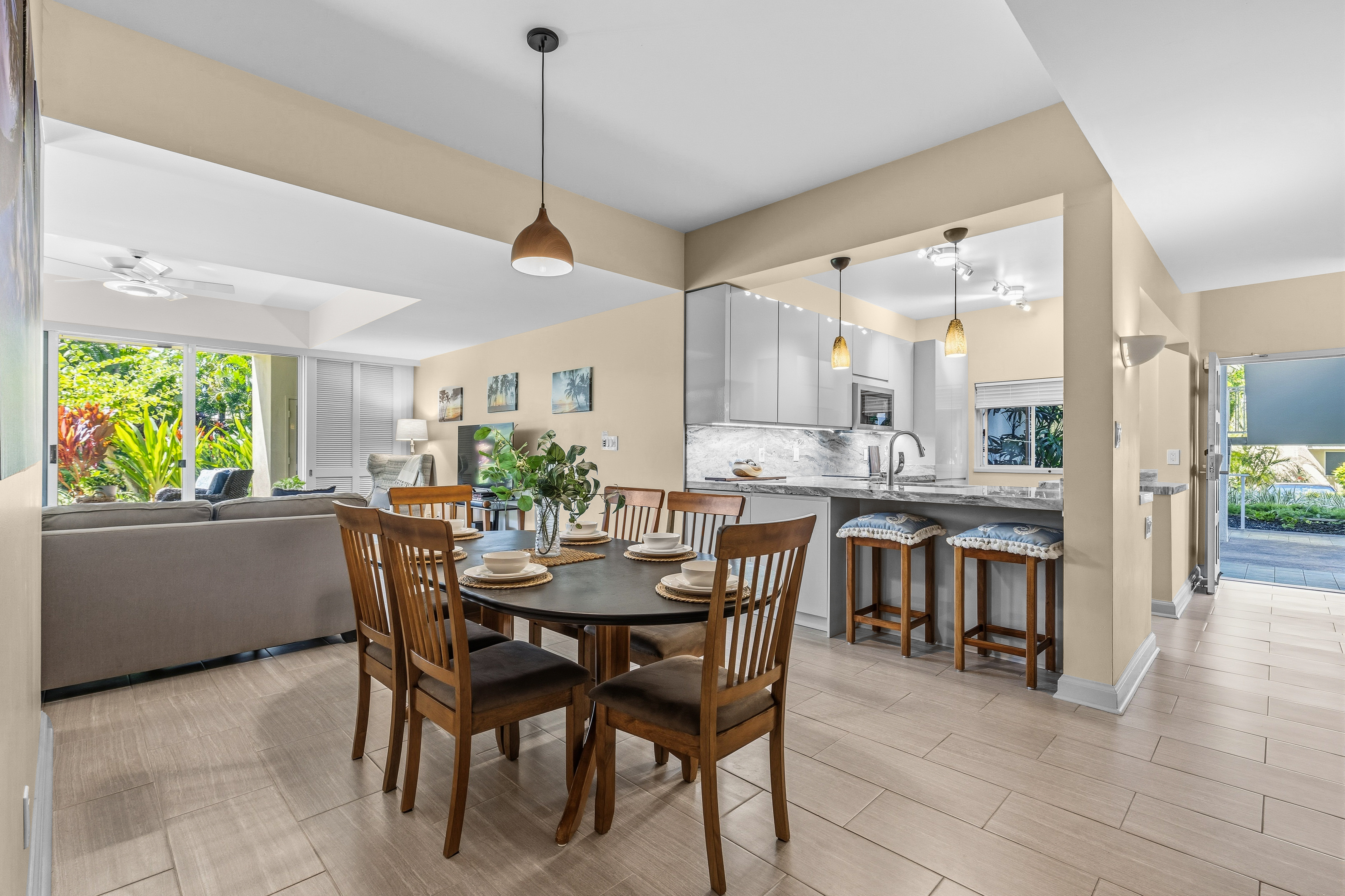 69-1010 Keana Place, Unit B101 Waikoloa, HI 96738 - Photo 1 of 30 a dining room with furniture and window