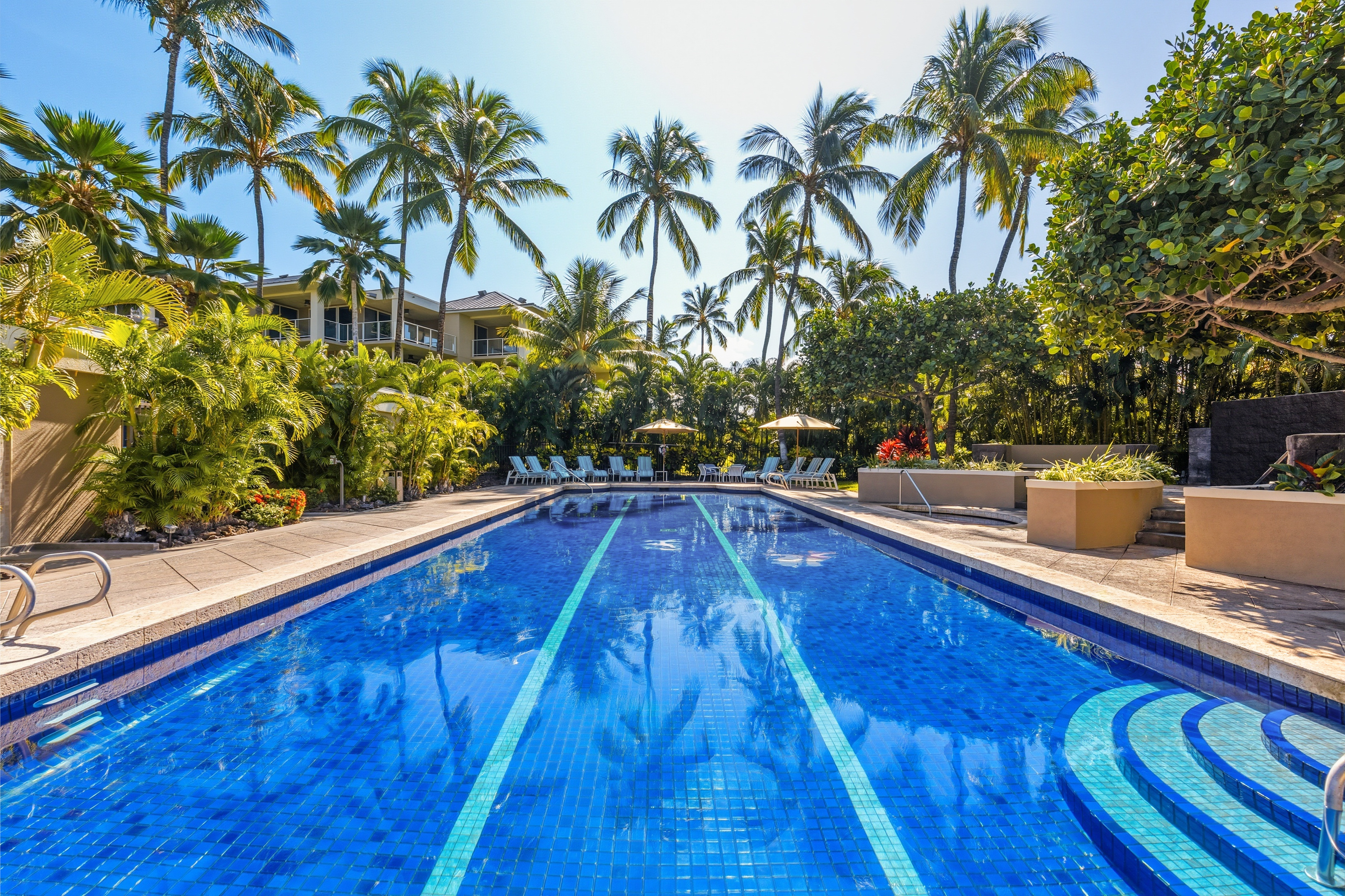 69-1010 Keana Place, Unit B101 Waikoloa, HI 96738 - Photo 20 of 30 a view of swimming pool with a garden