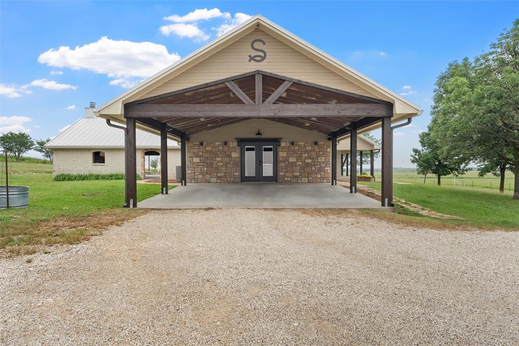 3057 Holy Road Abbott, TX 76621 - Photo 5 of 39 a front view of a house with garden