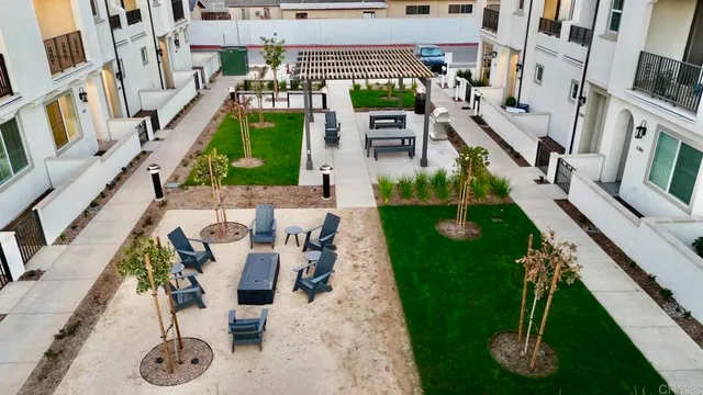a view of an chairs and tables in the patio