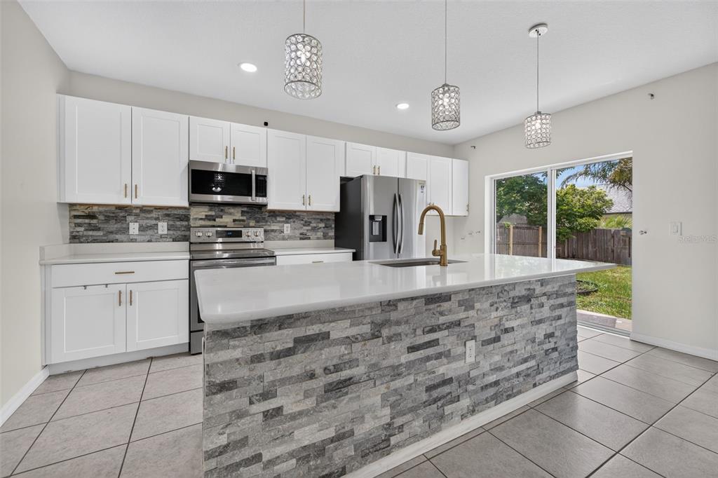 6479 Grapewood Road Spring Hill, FL 34609 - Photo 7 of 24