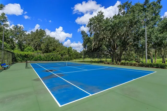 a view of a lake with a building in the background