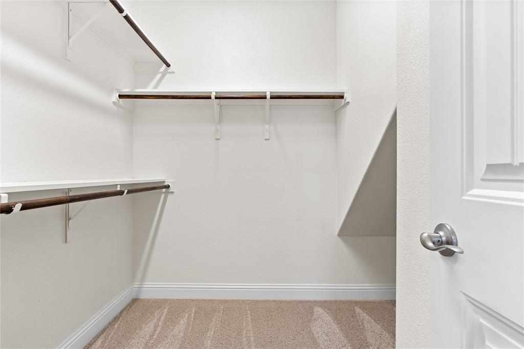 313 Tottenham Court McKinney, TX 75072 - Photo 17 of 31 a view of walk in closet