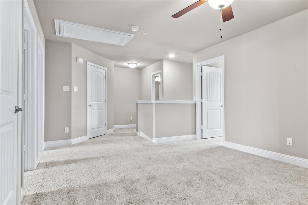 313 Tottenham Court McKinney, TX 75072 - Photo 21 of 31 an empty room with closet and windows