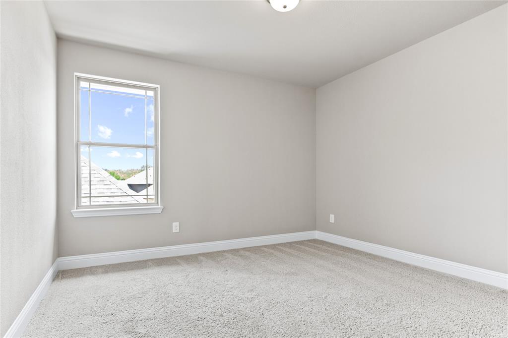 313 Tottenham Court McKinney, TX 75072 - Photo 23 of 31 an empty room with a window