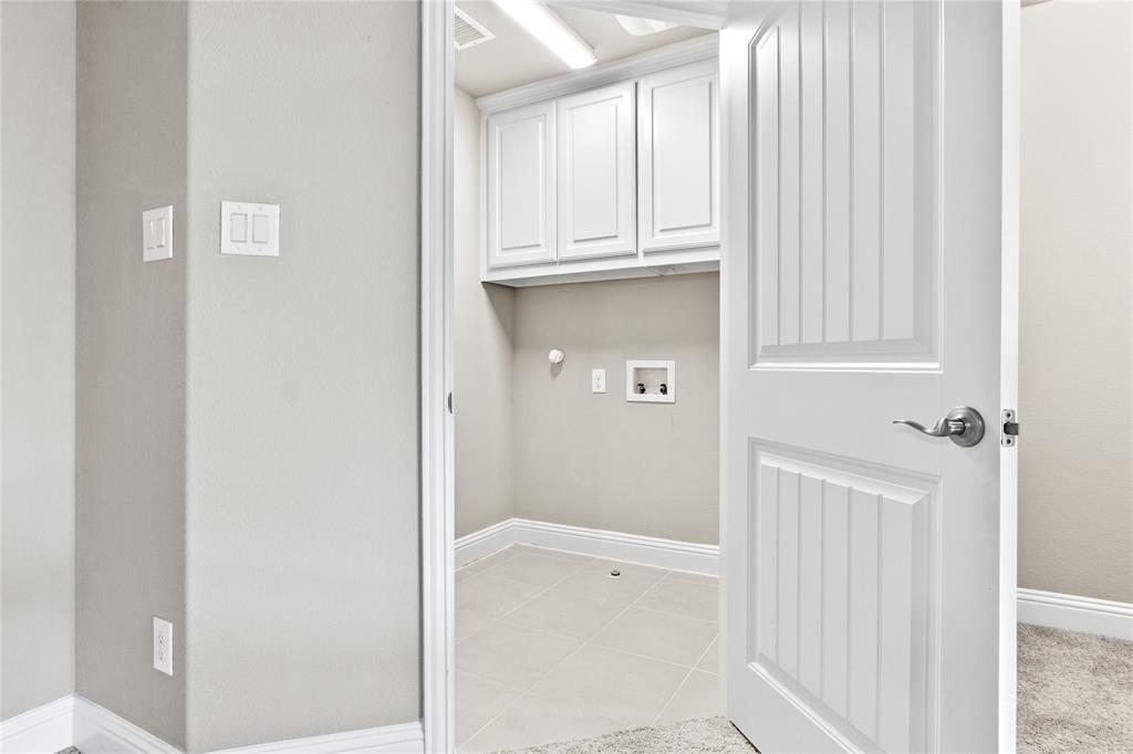 313 Tottenham Court McKinney, TX 75072 - Photo 27 of 31 a view of cabinets