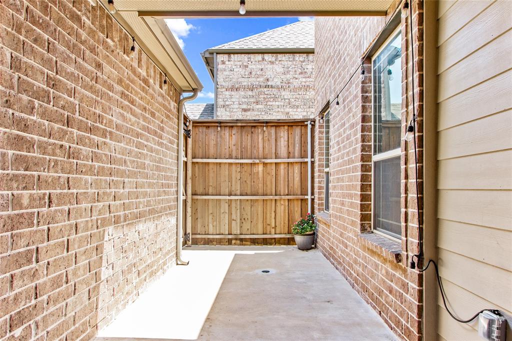 313 Tottenham Court McKinney, TX 75072 - Photo 30 of 31 a view of front door