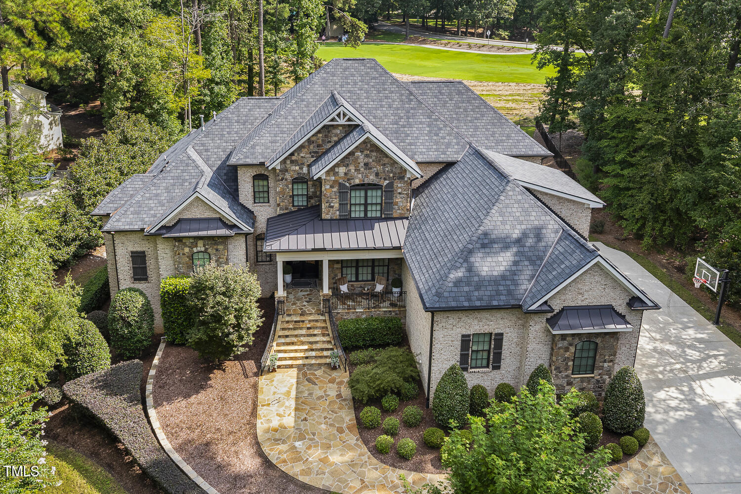 1205 Queensferry Road Cary, NC 27511 - Photo 3 of 63 a aerial view of a house with swimming pool
