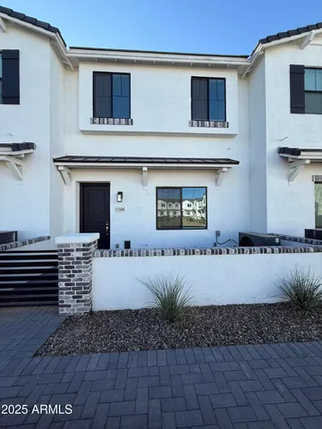 a view of a back yard of the house