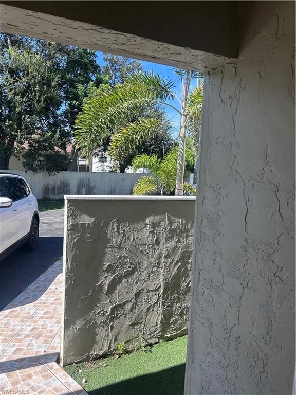 730 111th Avenue North Naples, FL 34108 - Photo 9 of 12 a view of a back yard from a balcony