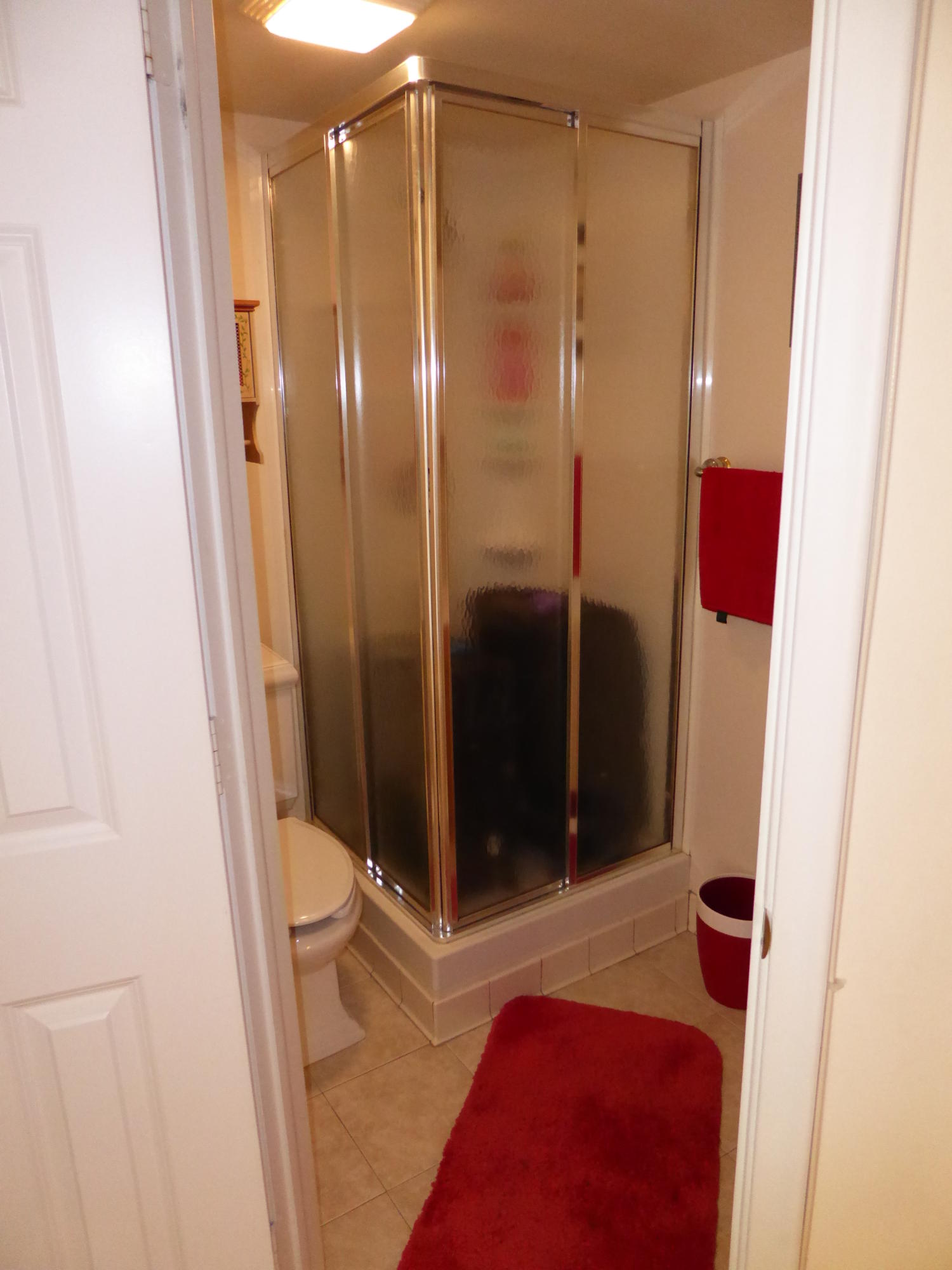 9911 Sandalfoot Boulevard, Unit 105 Boca Raton, FL 33428 - Photo 13 of 14 Guest Bath