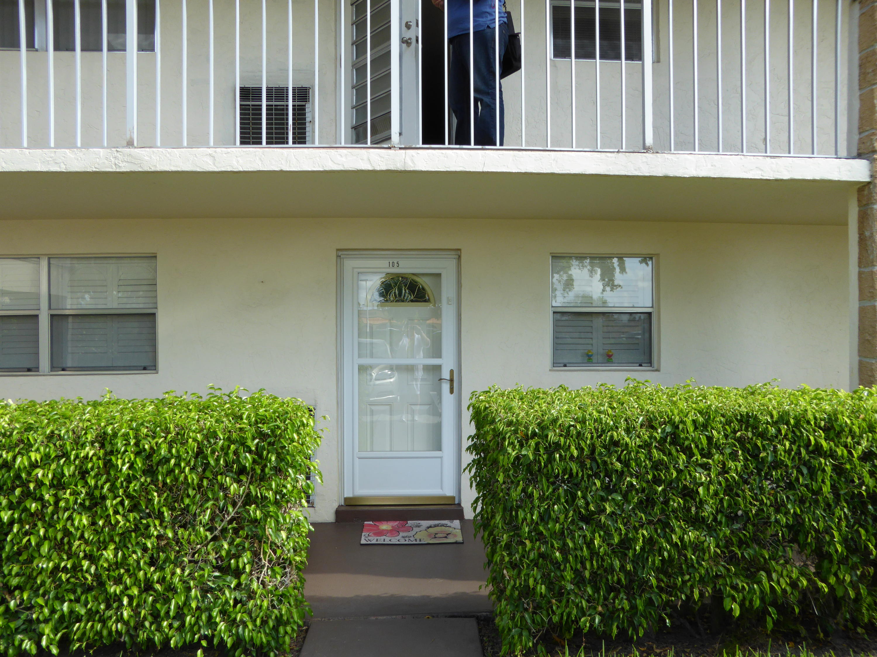9911 Sandalfoot Boulevard, Unit 105 Boca Raton, FL 33428 - Photo 3 of 14 Exterior Glass Door Entry