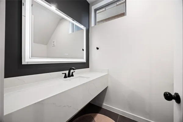 a view of storage and utility room with washer and dryer