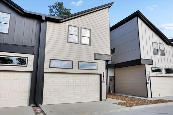 a view of a house with a garage