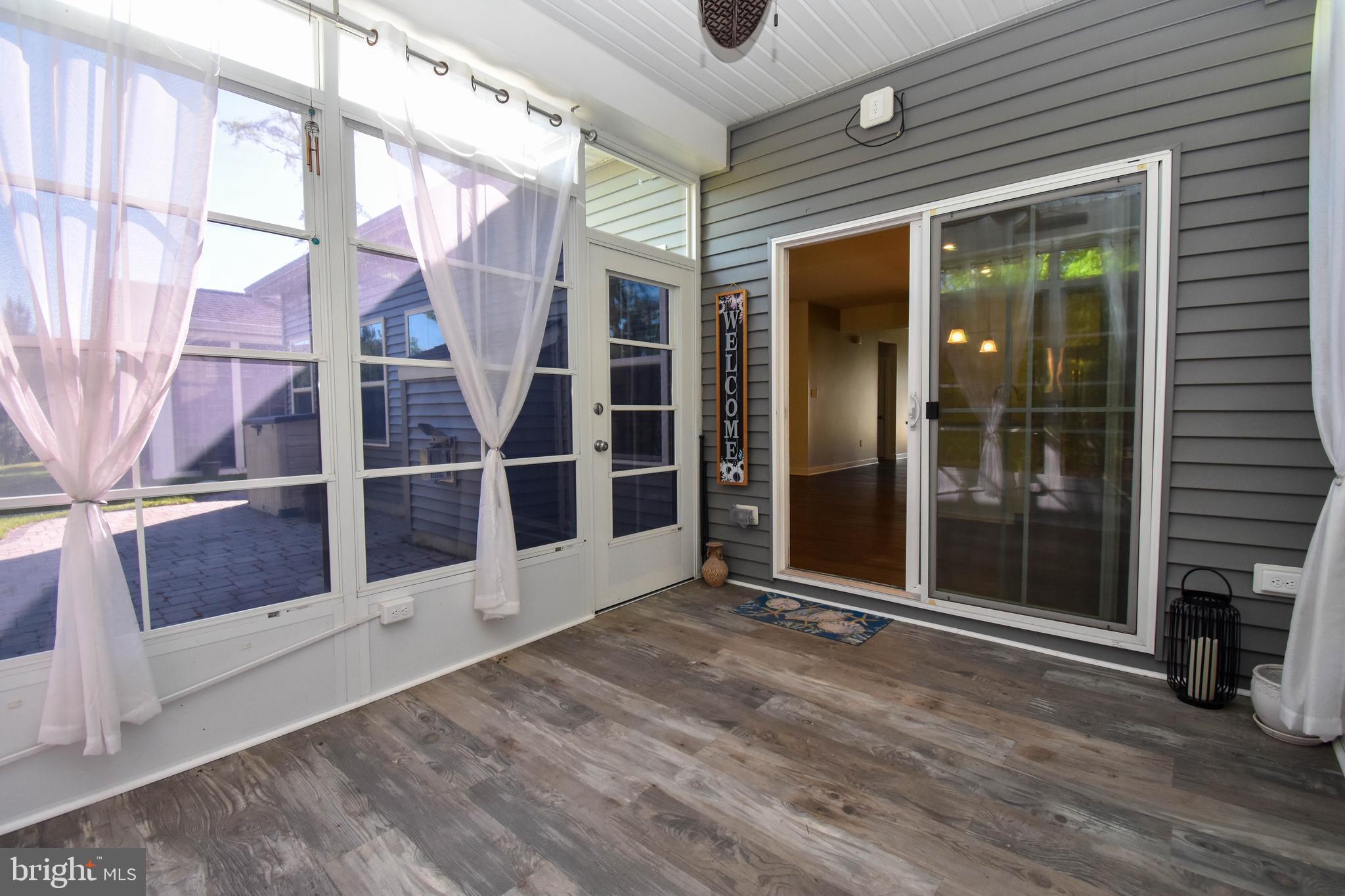 36611 Red Cedar Loop, Unit 19 Ocean View, DE 19970 - Photo 25 of 35 Sunroom
