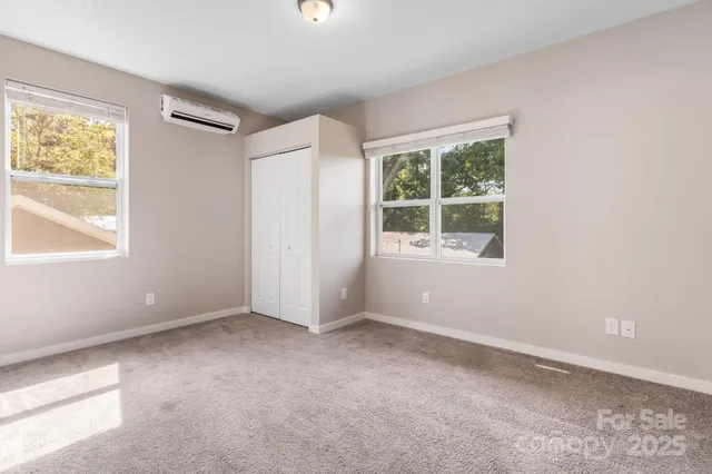 an empty room with windows