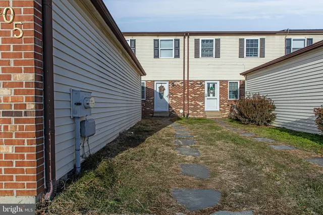 a view of a back yard of the house