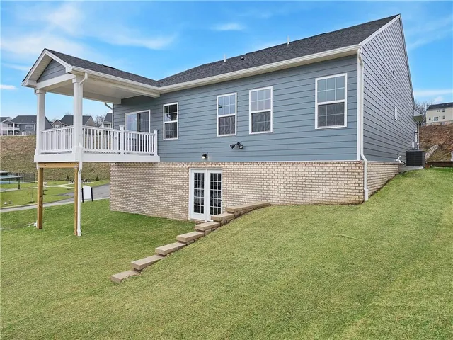 a front view of house with yard