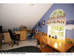 266 Smokies Ridge Waynesville, NC 28786 - Photo 8 of 9 a view of a dining room with furniture