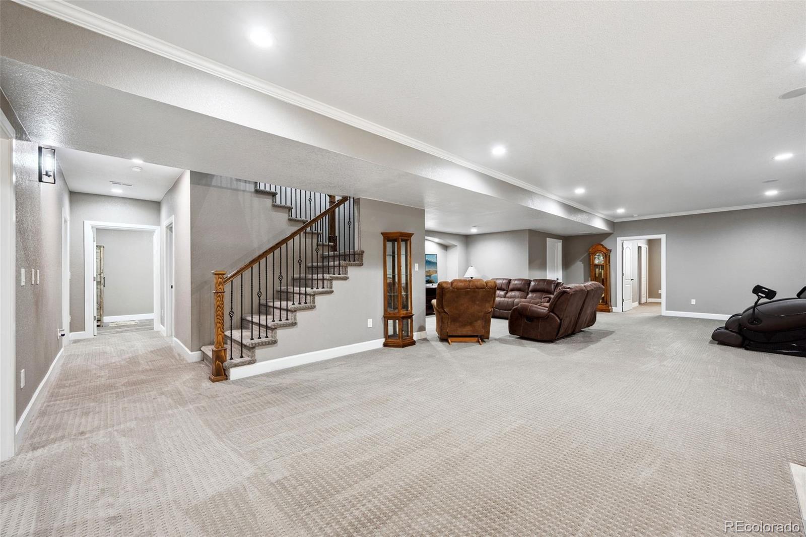 156 Chapel Hill Circle Brighton, CO 80601 - Photo 30 of 48 a view of livingroom with furniture and stairs