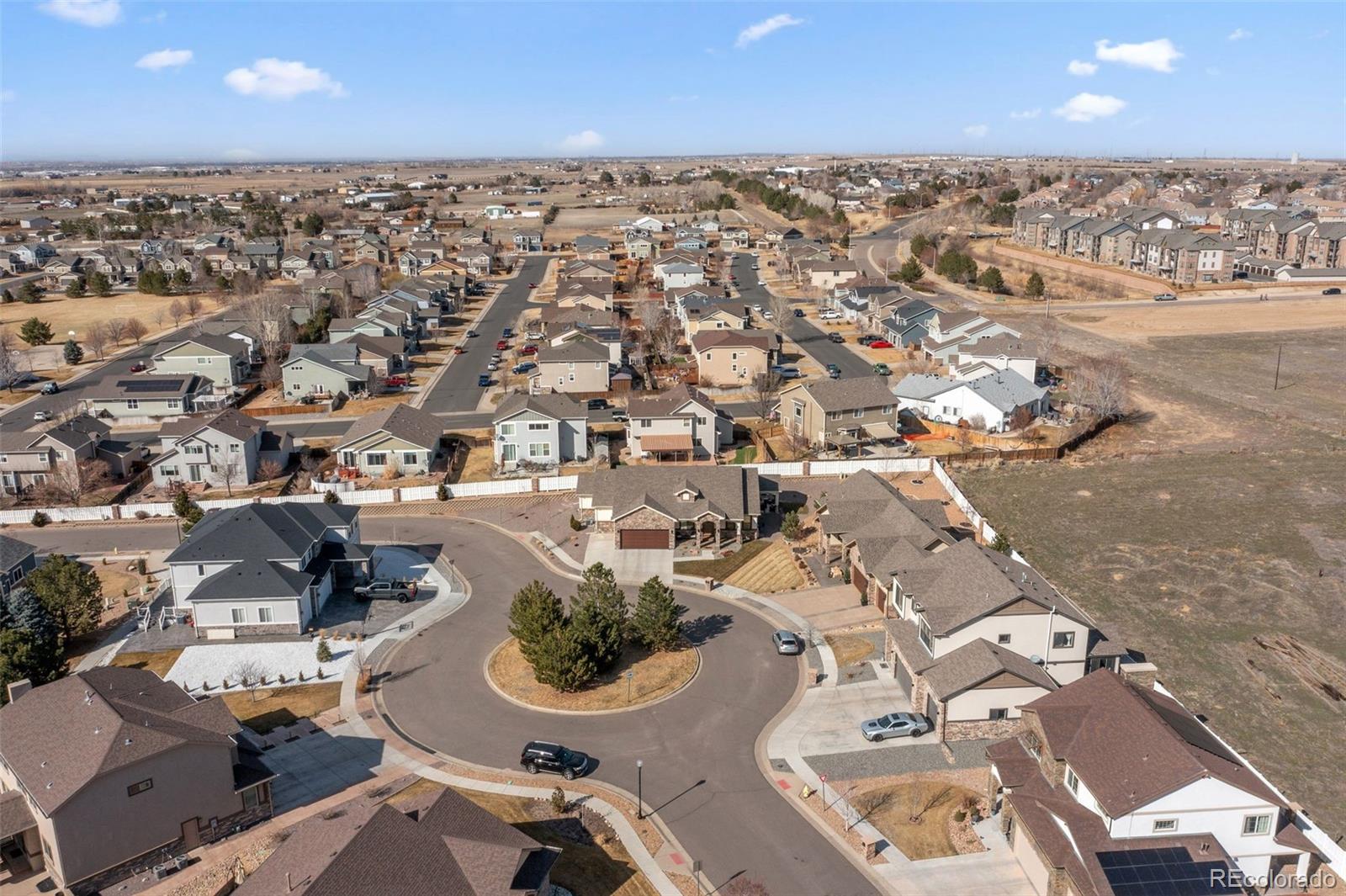 156 Chapel Hill Circle Brighton, CO 80601 - Photo 48 of 48 an aerial view of residential houses with outdoor space