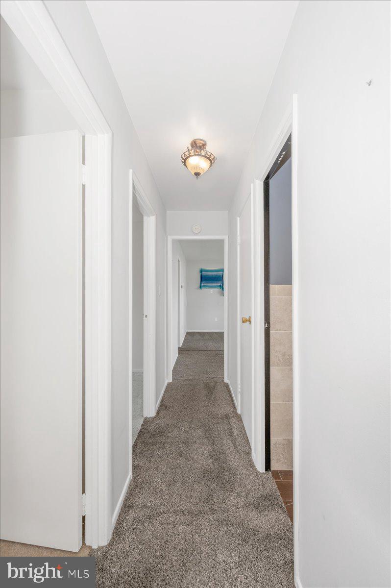 207 Barbara Street Frederick, MD 21701 - Photo 20 of 46 a view of a hallway with closet