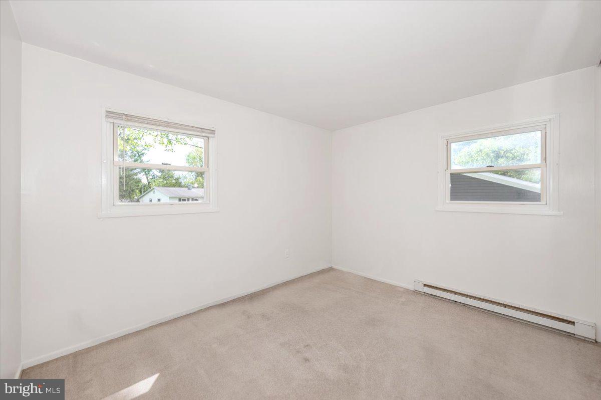207 Barbara Street Frederick, MD 21701 - Photo 22 of 46 an empty room with windows