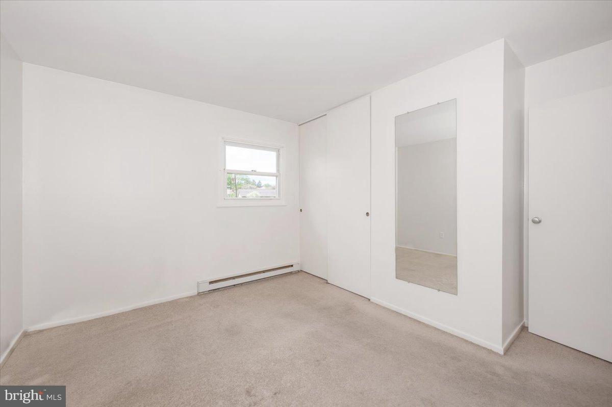207 Barbara Street Frederick, MD 21701 - Photo 23 of 46 an empty room with windows
