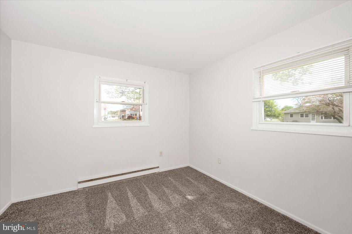 207 Barbara Street Frederick, MD 21701 - Photo 25 of 46 an empty room with windows