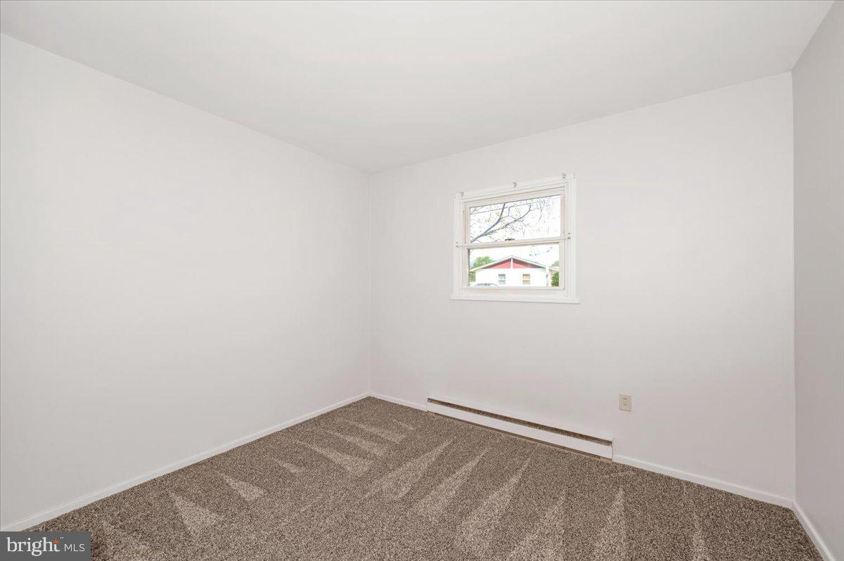 207 Barbara Street Frederick, MD 21701 - Photo 26 of 46 an empty room with a window