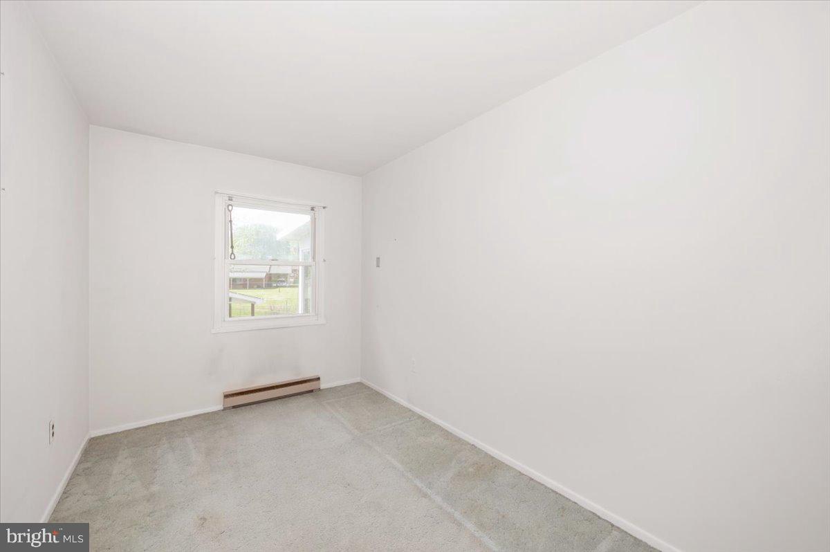 207 Barbara Street Frederick, MD 21701 - Photo 29 of 46 an empty room with a window